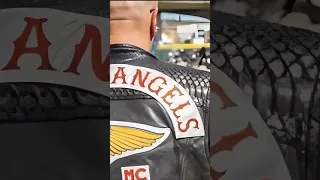 Mongols Boss spots a Hells Angel behind him