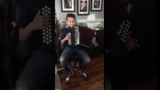 neto trying the accordion