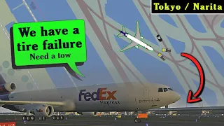 FedEx MD-11 has BURST TIRES AFTER LANDING and becomes Disabled