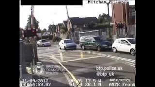 CCTV captures drivers dicing with death at level crossings in Britain
