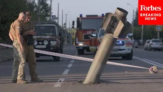 Ukrainian Soldiers Deal With Russian Missile Lodged In Road After Shelling Of Kramatorsk, Ukraine