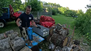 Firewood stacking in bags using Espegard vippstativ