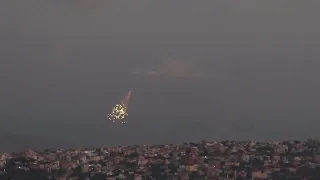 Israeli shells hit suspected rocket launch sites in Lebanon, causing fire