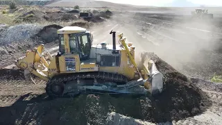 Two Caterpillar D9T And Komatsu D275AX Bulldozers Working On Huge Mining Area