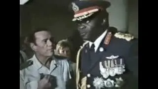 Idi Amin visits the hostages at Entebbe Airport, Uganda, 1976