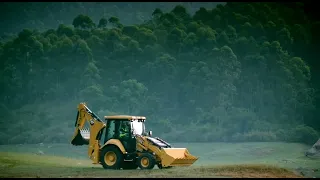 NEW CAT BACKHOE LOADER