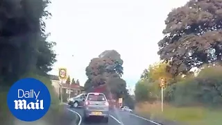 Shocking dashcam footage shows brazen driver spinning 180 degrees - Daily Mail
