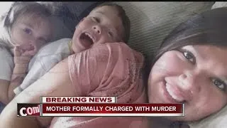 Mother formally charged with murder of two young children