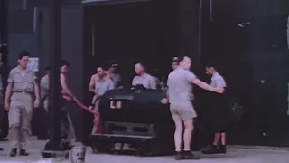 The 1st atomic bomb Little Boy being wheeled out and loaded onto Enola Gay in HD