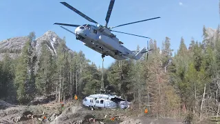 Gigantic US CH-53 Lifts Damaged Helicopter from Mountain Site