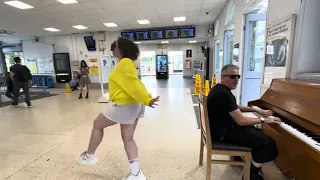 Girl In Yellow Rocks Out By The Public Piano