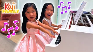 Emma and Kate Practice Their Piano Performance!