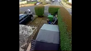 Kid crashes into garden gate on bike