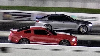 700 HP GT500 vs Dinan BMW M5 Twin Turbo - 1/4 mile Drag Race - Road Test TV®