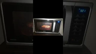 Pizza in convection microwave oven. #pizza #baking #shorts