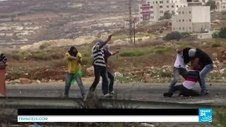 Shocking footage shows Israeli soldiers disguised as Palestinian protesters firing at stone-throwers