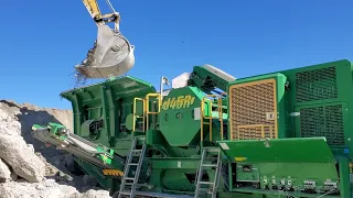 McCloskey J45R Crushing Coquina into McCloskey ST80TLA Radial Track Stacker, Making Road Base.