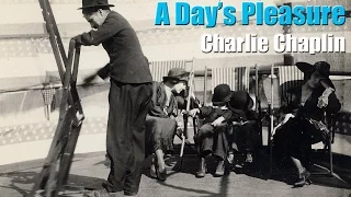 Charlie Chaplin struggles with a deck chair ("A Day's Pleasure")