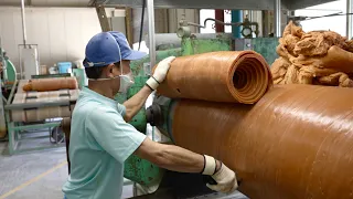 The process of mass-producing rubber bands. A rubber band manufacturing factory in Japan.