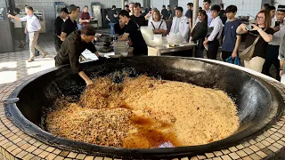 A large pilaf in a big pot l National dishes