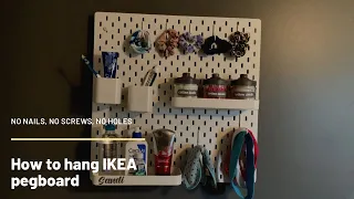 How to hang an IKEA pegboard without screws, using Command Strips