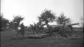 British troops load and fire an Allied 8 inch artillery battery in France during ...HD Stock Footage