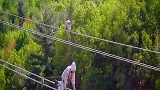 The world highest voltage line maintenance worker.