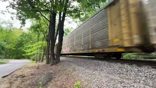 CSX M276 at Garrett Park, MD With a SD70mac as the DPU