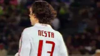 Striker tries to  press Nesta