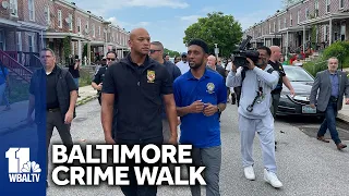 Governor stops short of endorsing mayor at crime walk