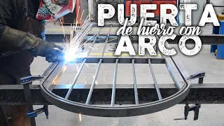 PUERTA DE HIERRO CON ARCO