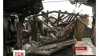 Знову під вогнем: бойовики розбили більше десятка будинків у Мар'їнці