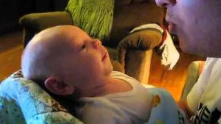 Cutest cooing baby singing with papa!