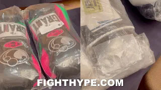 FULTON'S TRAINER INSPECTS INOUE'S "OPEN” GLOVES & CLAIMS A PAIR WAS TAPED AT GLOVE SELECTION