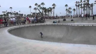 9 year old kid rocking the bowl at the Venice Beach skatepark.