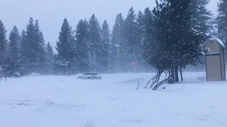 Blizzard conditions in Sierra Nevada Mountains, massive wildfire burning in Texas Panhandle