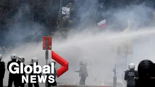 COVID-19: Belgium police use water cannons, tear gas on protesters marching against restrictions