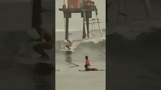 Surfing on crowded wave at Batukaras, Indonesia