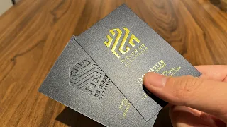 Embossed Logo and Metallic Gold Foil on Business Card Printing using Dark Textured Paper