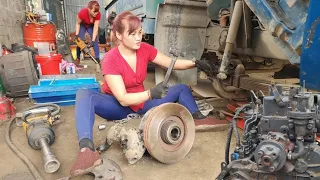 Genius girl repairs and restores a car.