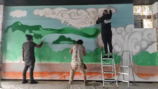 Graffiti Painting a Mural of Ranginui and Papatuanuku