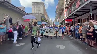 Darryl "Dancing Man 504" Young leads the French Quarter Fest kick-off parade