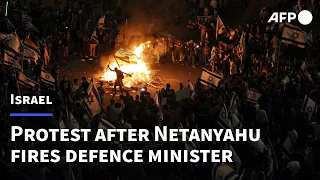 Thousands of Israelis take to the streets after Netanyahu fires defence minister | AFP