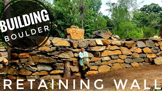 Building a Boulder Retaining Wall 44'l x 8'h x 5'w | Proper methods | Basic Principles | Dry Stack