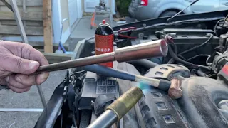 Trick to remove a rounded spark plug in a deep hole
