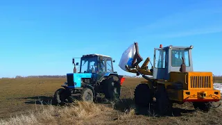 Замерзла вода в баках МТЗ-82, на внесение минеральных удобрений. ТО-30 в работе со стрелой.