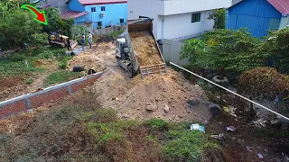 Dozer not roof pushing soil to build foundation house help moving by dump trucks unloading