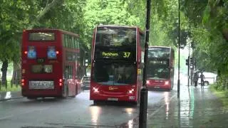 London's Buses in the rain at Clapham Common 7th June 2014