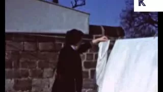 1950s Housewife Hangs Up Washing Outside - UK Home Movies