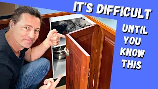 How to adjust a kitchen corner cabinet